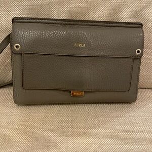 Furla crossbody wallet in pebbled gray leather with gold accents